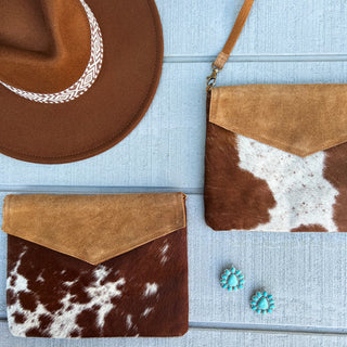 COWHIDE CLUTCH/CROSSBODY